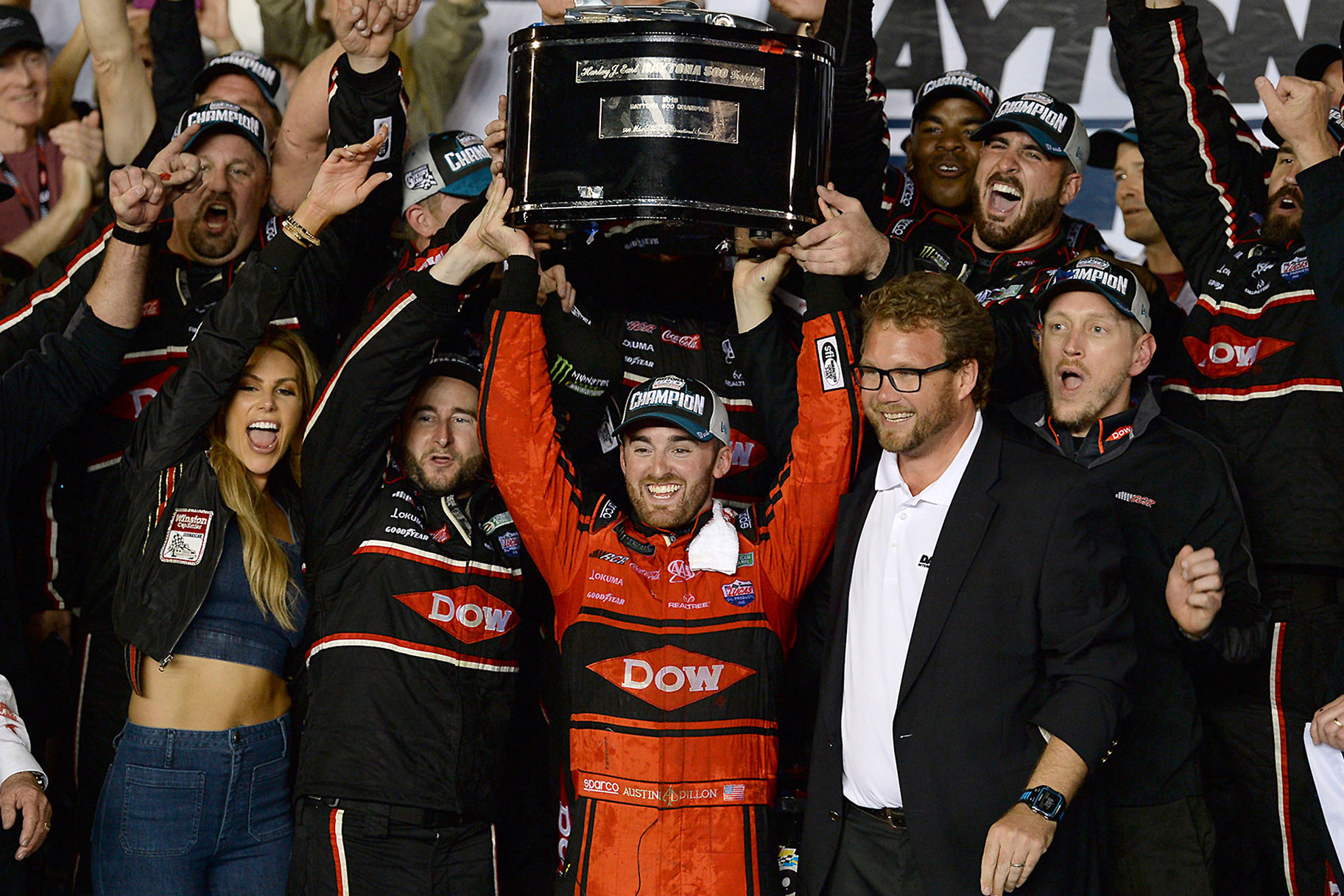 Austin Dillon celebrating his 2018 Daytona 500 win with his team