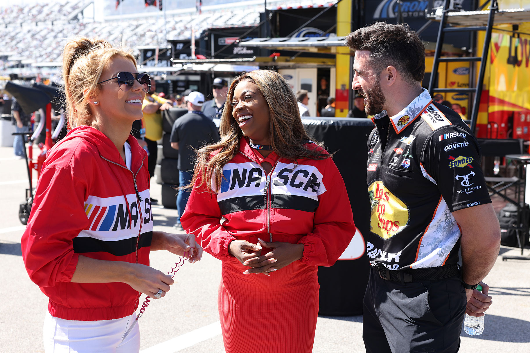 Whitney, Mariel, and Paul talking and laughing with each other