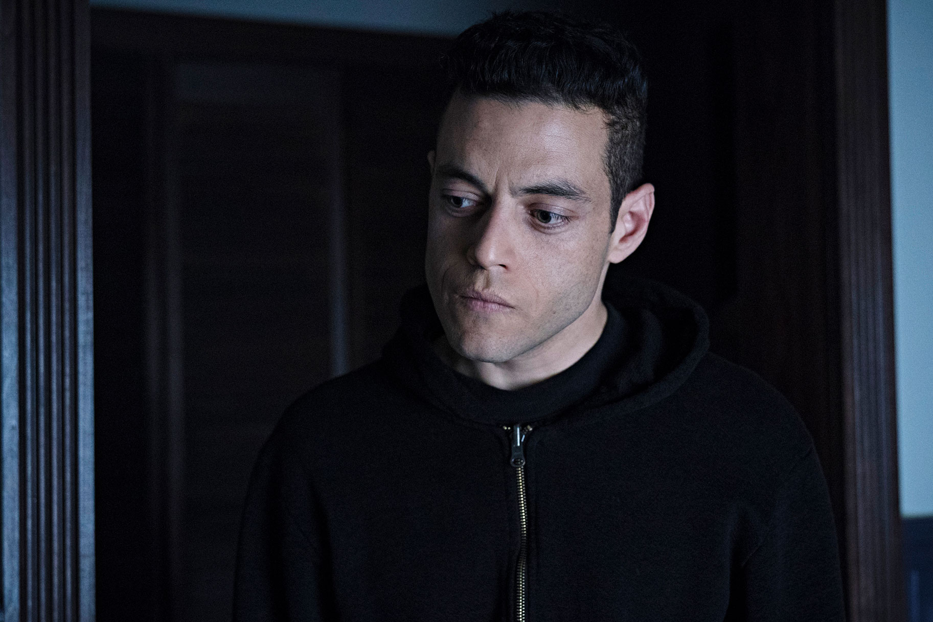 Rami Malek as Mr Robot, wearing a black hoodie