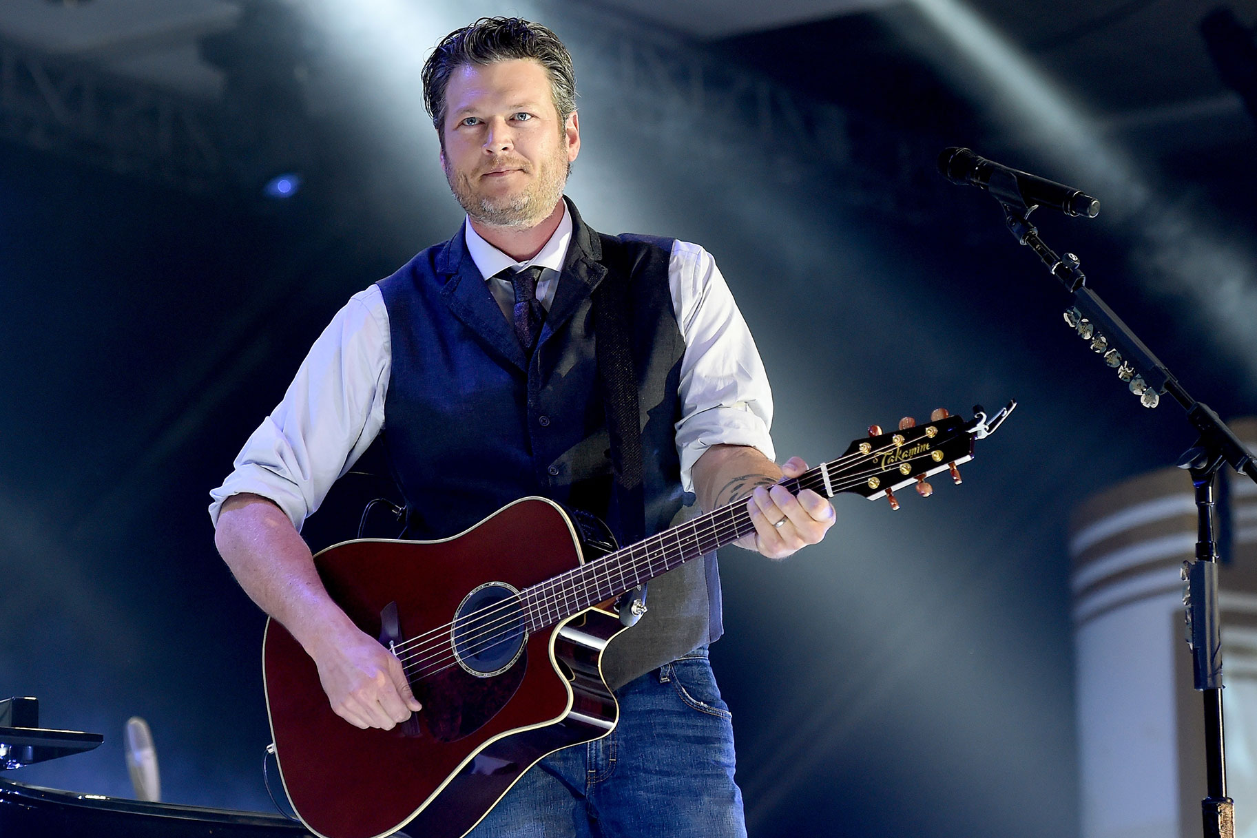 Blake Shelton performing on a stage