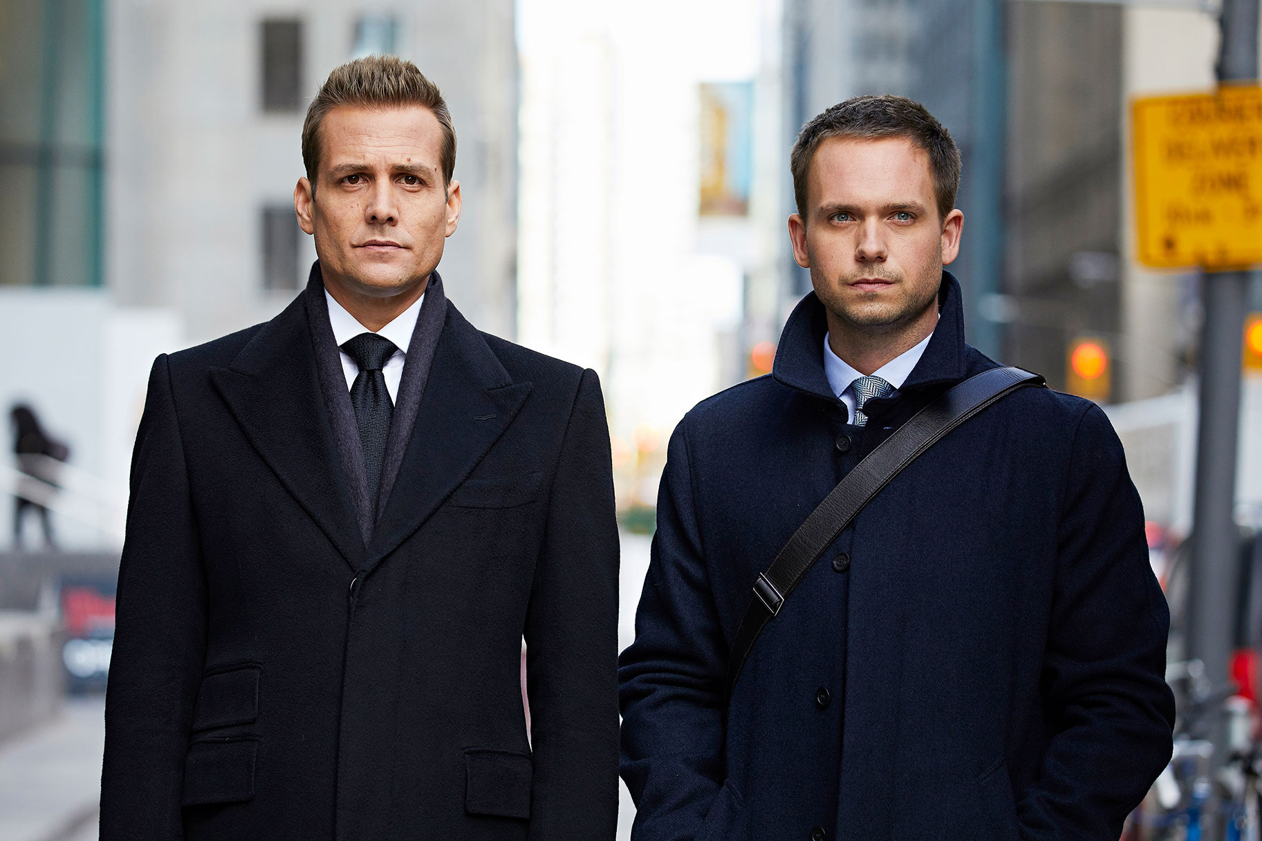 Gabriel Macht as Harvey Specter and Patrick J. Adams as Michael Ross in a promotional image for Season 1 of Suits