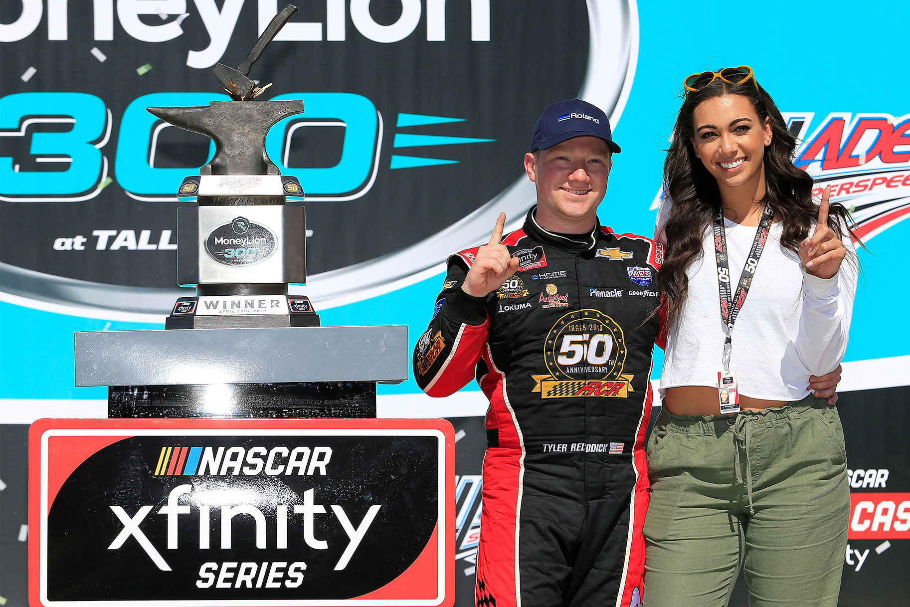 Tyler Reddick posing with his girlfriend Alexa DeLeon