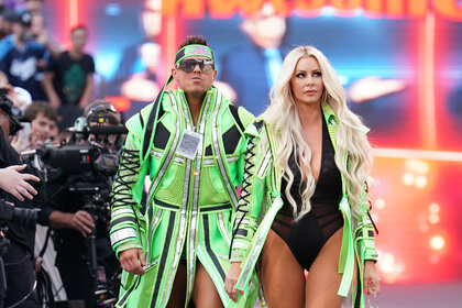 Miz and Maryse walking to the stage