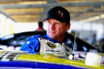 Dave Blaney leaning against his car