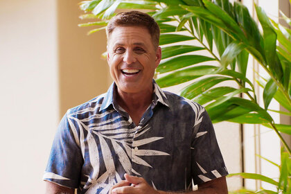 Mark L Walberg smiling on the set of Temptation Island