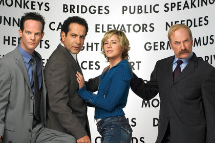 Pictured: (l-r) Jason Gray-Stanford as Lt. Randall Disher, Tony Shalhoub as Adrian Monk, Traylor Howard as Natalie Teeger, Ted Levine as Captain Leland Stottlemeyer