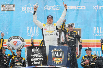 Kyle Busch, driver of the #8 Lucas Oil Chevrolet, celebrates in victory lane after winning the NASCAR Cup Series Pala Casino 400 at Auto Club Speedway on February 26, 2023