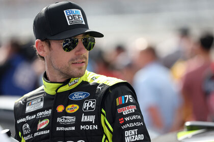 Ryan Blaney, driver of the #12 Menards/Blue DEF/PEAK Ford, waits on the grid prior to the NASCAR Cup Series 65th Annual Daytona 500