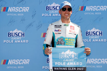 Nascar Denny Hamlin Denny Hamlin poses for photos after winning the pole award