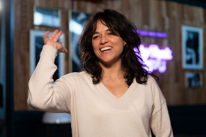 Michelle Rodriguez smiles