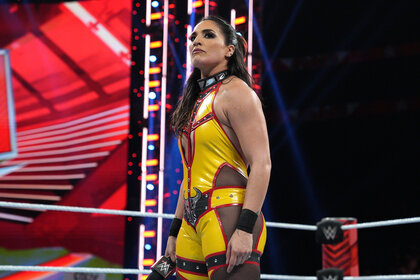 Raquel Rodriguez stands in the ring