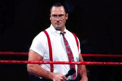 Mike Rotunda stands in the ring as 'IRS'.