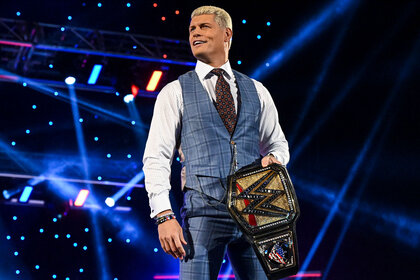 Cody Rhodes stands with his SmackDown championship belt in his hand