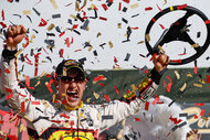 Joey Logano Celebrating a win