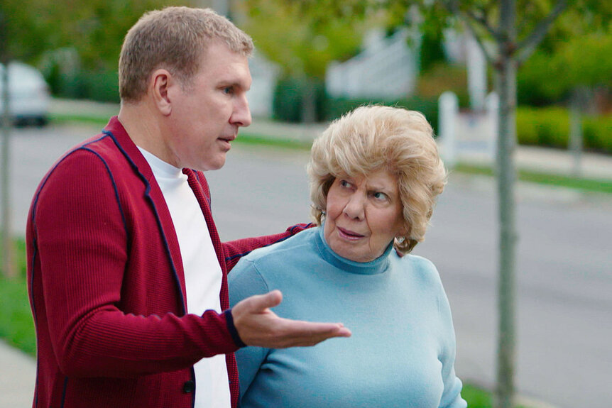 Nanny Faye looking at Todd with a comical worried expression on her face