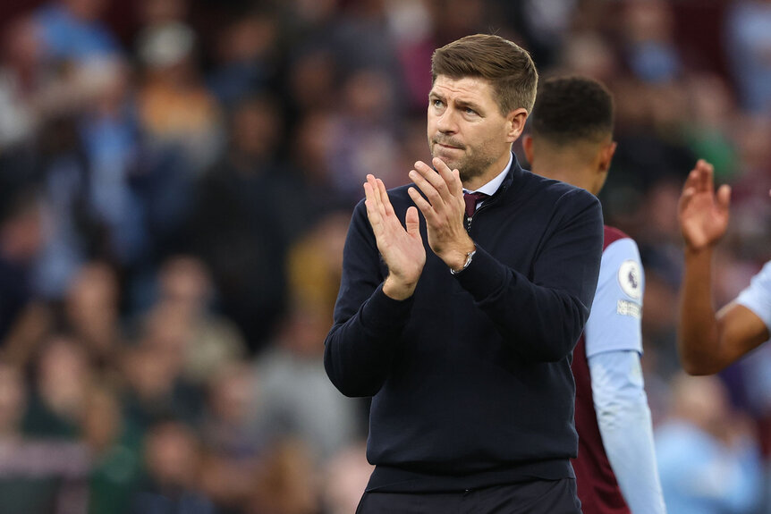 English Premier League Coach Applauding