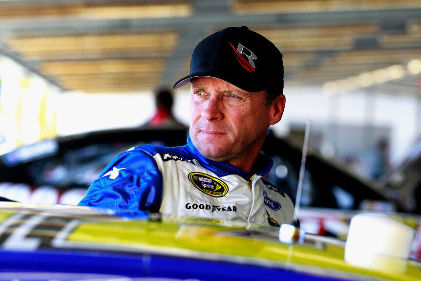 Dave Blaney leaning against his car