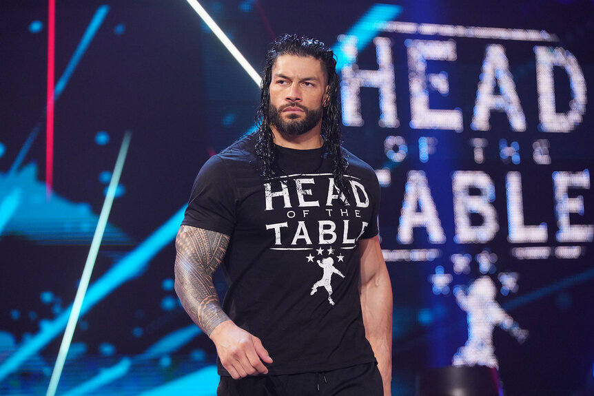 Roman Reigns walks towards the ring