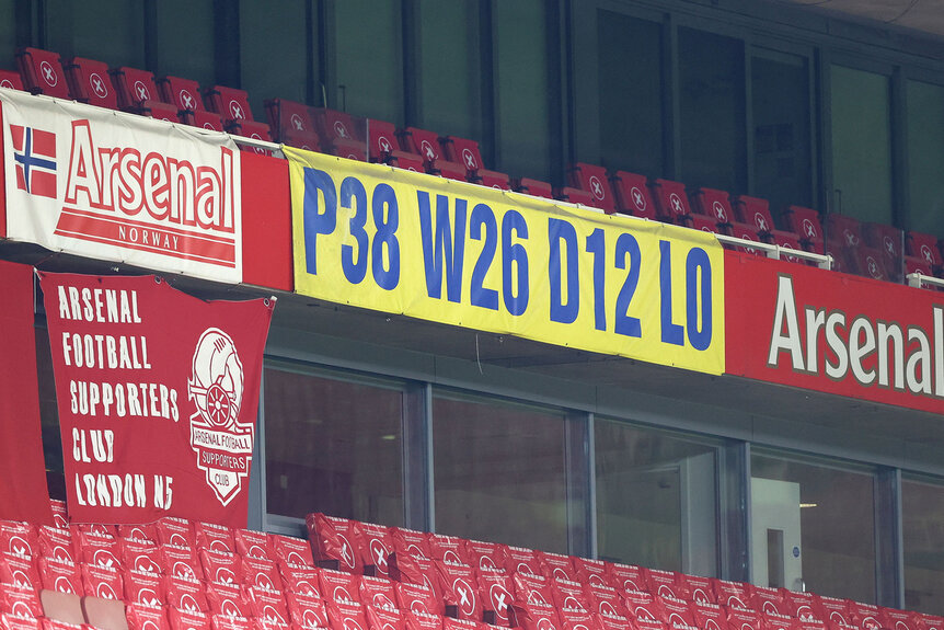 A banner referencing Arsenal's 'invincibles' season 2003-2004