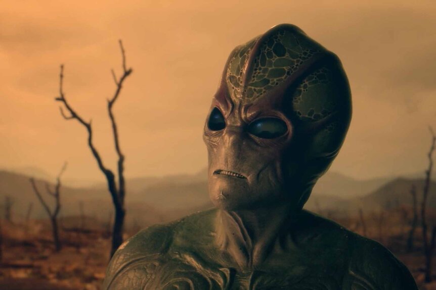 An alien appears a desert in Resident Alien Season 3.