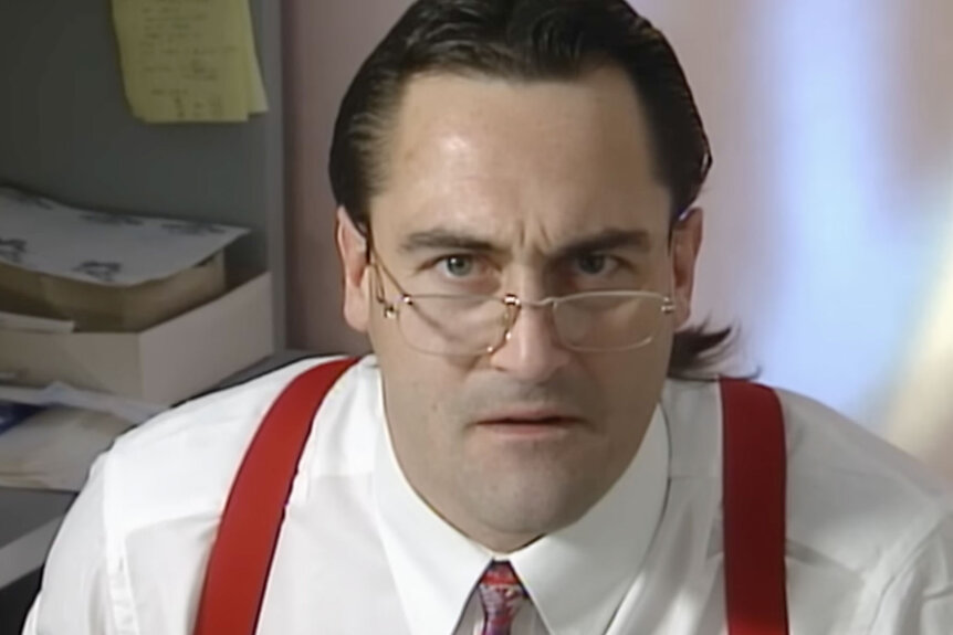 Mike Rotunda speaks to the camera in a WWF skit