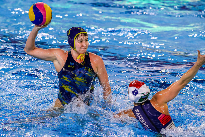 Aizhan Akilbayeva and Rita Keszthelyi compete in water polo.