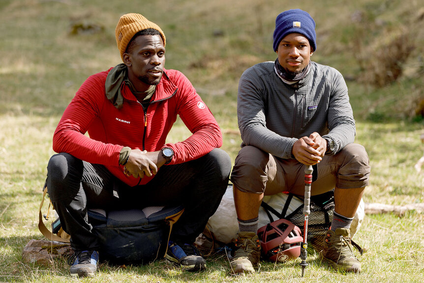 Steffen Jean-Pierre and Mikhail Martin sit together in Race to Survive: New Zealand