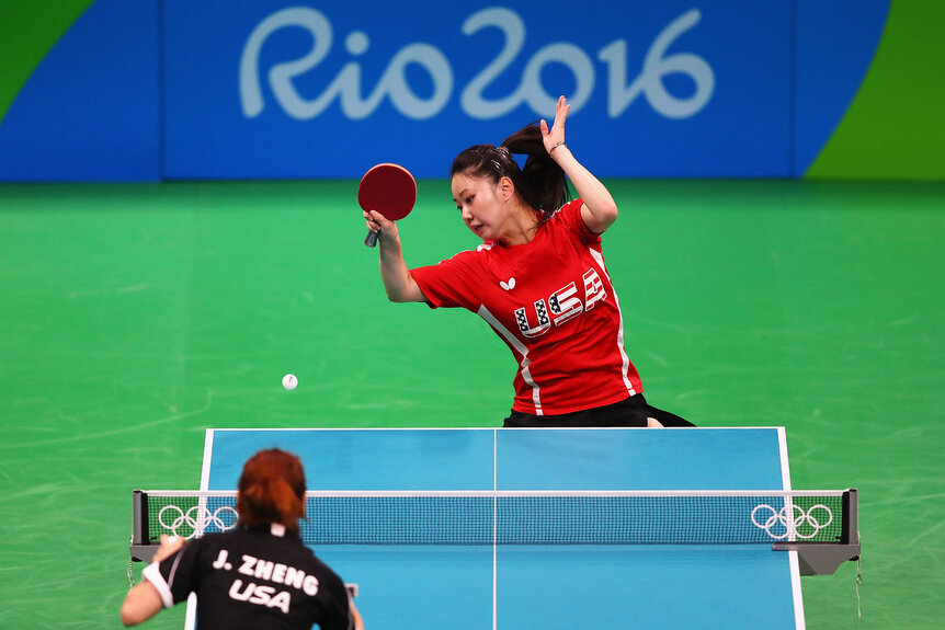 Lily Zhang of Team USA hits the ball at the Table Tennis practice session during the Olympics preview day - 2 at Rio Centro