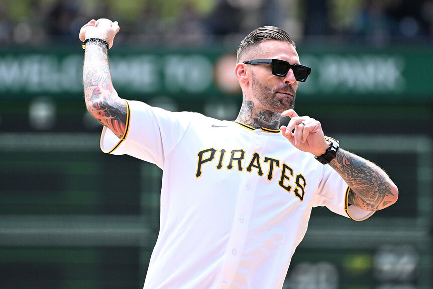 Corey Graves of the WWE throws out a first pitch before the game between the Pittsburgh Pirates and the Atlanta Braves