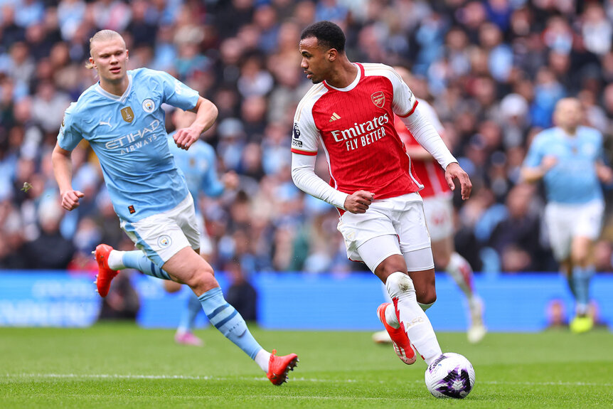 Erling Haaland of Manchester City and Gabriel Magalhaes of Arsenal during the Premier League match between Manchester City and Arsenal FC