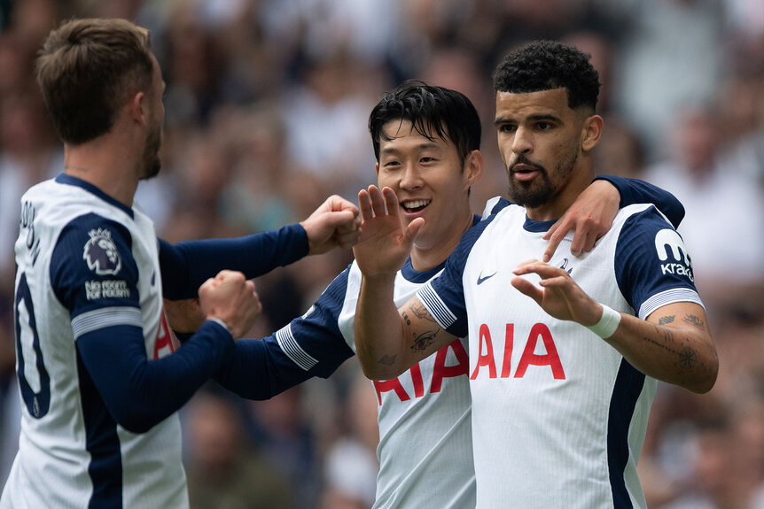 Dominic Solanke of Tottenham Hotspur (right) celebrates his goal with Heung-Min Son and James Maddision